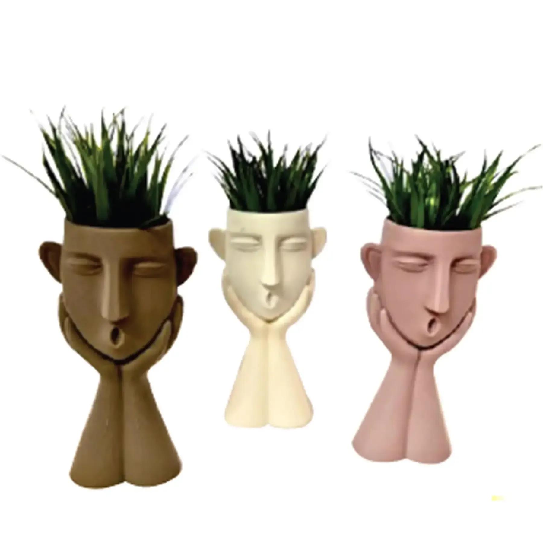 Pot avec fleur artificielle